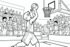 Un niño juega al baloncesto.