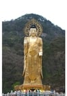 Fotos Estatua de oro Maitreya
