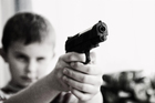 Fotos niño con arma