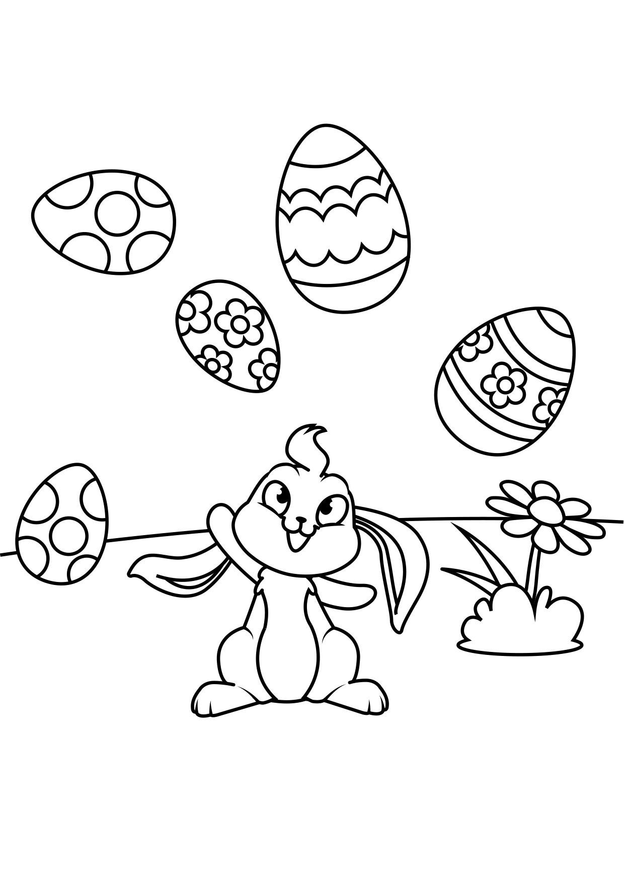 conejito de pascua juega con huevos de pascua Dibujo para colorear conejito de pascua juega con huevos de pascua